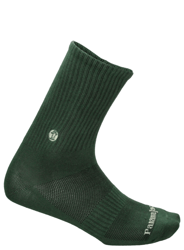 Calcetines unisex en verde, con perfil discreto, adecuados para combinar con zapatillas o botas.
