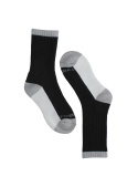 Calcetines negros de lana Merino, adecuados para combinar con botines de cuero o botas outdoor.