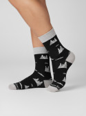 Calcetines unisex de lana Merino negra para uso diario y actividades outdoor.