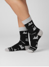 Calcetines unisex de lana Merino negra para uso diario y actividades outdoor.