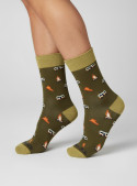 Calcetines unisex verdes de lana Merino con tejido suave y gestión natural de humedad.