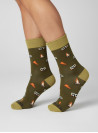 Calcetines unisex verdes de lana Merino con tejido suave y gestión natural de humedad.