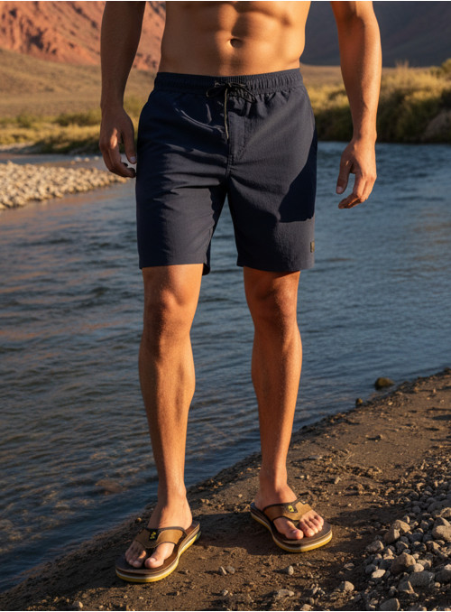 Traje azul de hombre en tejido ligero con acabado liso y caída limpia.