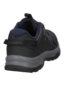 Zapatilla de trekking unisex azul, con suela ULTRACTION para excelente agarre en superficies irregulares.