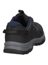Zapatilla de trekking unisex azul, con suela ULTRACTION para excelente agarre en superficies irregulares.