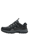 Zapatilla gris unisex con refuerzos en áreas clave para mayor protección y estabilidad.