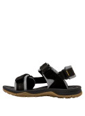 Calzado negro infantil, diseño casual, recomendado para días cálidos y actividades urbanas.