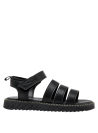 Calzado casual negro para niña, suela plana y flexible, comodidad asegurada.