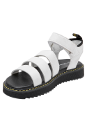 Sandalia plana blanca para niña, estilo casual, ideal para actividades al aire libre.