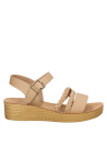 Sandalia casual beige para niña, estilo urbano, ideal para jugar y explorar la ciudad.