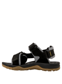 Calzado negro de tiras para niño, cómodo y funcional en estilo casual.