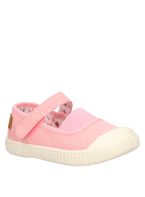 Zapatos de niña rosados, diseño sencillo, perfectos para explorar la ciudad.