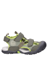 Sandalias de taco plano verde, diseñadas para aventuras diarias de niños.
