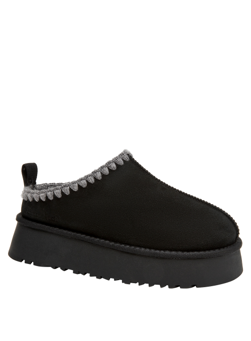 Bota casual negra para mujer, taco plano cómodo, recomendada para actividades diarias y descanso.