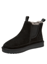 Botín Chelsea negro para mujer, estilo casual, ideal para actividades al aire libre.