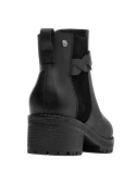 Botín negro de cuero para mujer, diseño trenzado, perfecto para escapadas al aire libre.