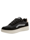 Zapatilla negra casual para mujer, ideal para paseos y actividades al aire libre.