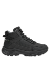 botines negros para hombre con altura de taco de 5 cm, ideales para un look casual y funcional.