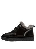 Zapatillas negras casuales para mujer, estilo rústico, ideales para actividades diarias.