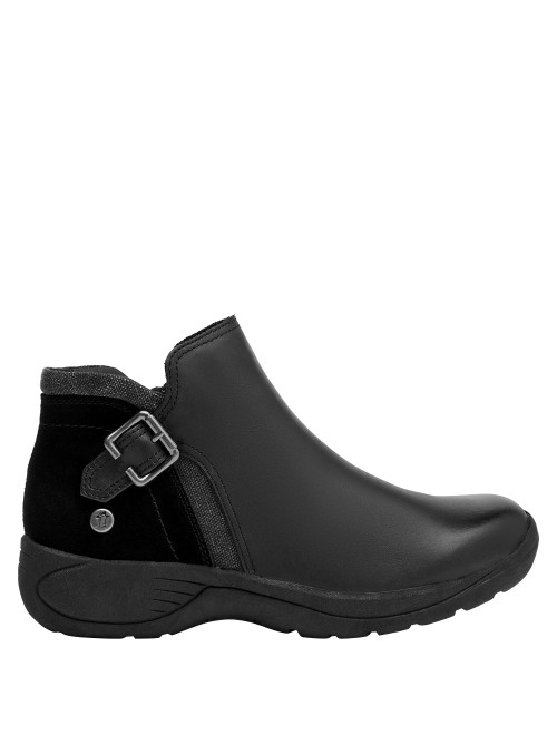 Botín casual negro de mujer, confeccionado en suave cuero, ideal para un look urbano y despreocupado.