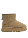 Pantuflas camel para mujer, diseño acogedor, perfectas para un ambiente cómodo y relajado.