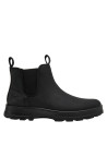 Botín negro de hombre, estilo Chelsea, adecuado para combinar con jeans o chinos.