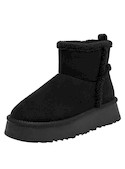 Botín negro casual para mujer, diseño sofisticado en material sintético, ideal para actividades diarias.