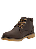 Botín de cuero moreno para hombre, estilo urbano, ideal para actividades casuales.